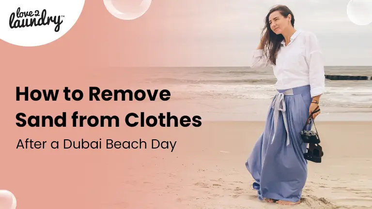 remove sand from clothes